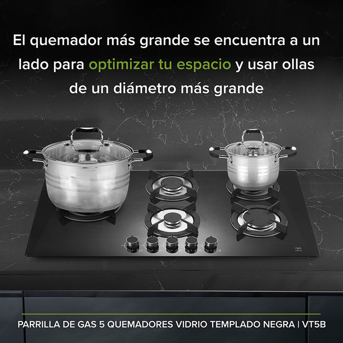 Parrilla negra de vidrio templado con ollas de acero inoxidable encima.