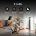 Ventilador de torre en sala con 4 modos: natural, normal, sueño e infantil, ideal para el descanso de un bebé.